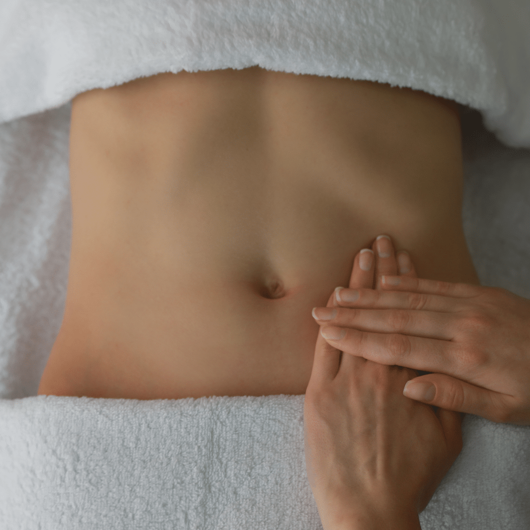 massage on womans belly lymphatic drainage