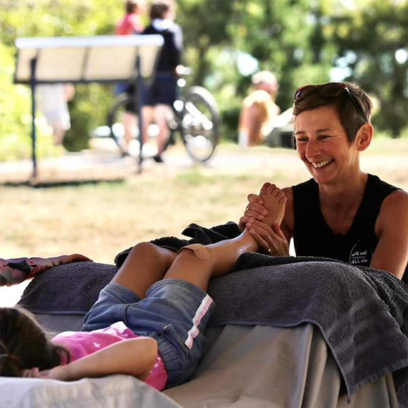 body work foot massage woman and child